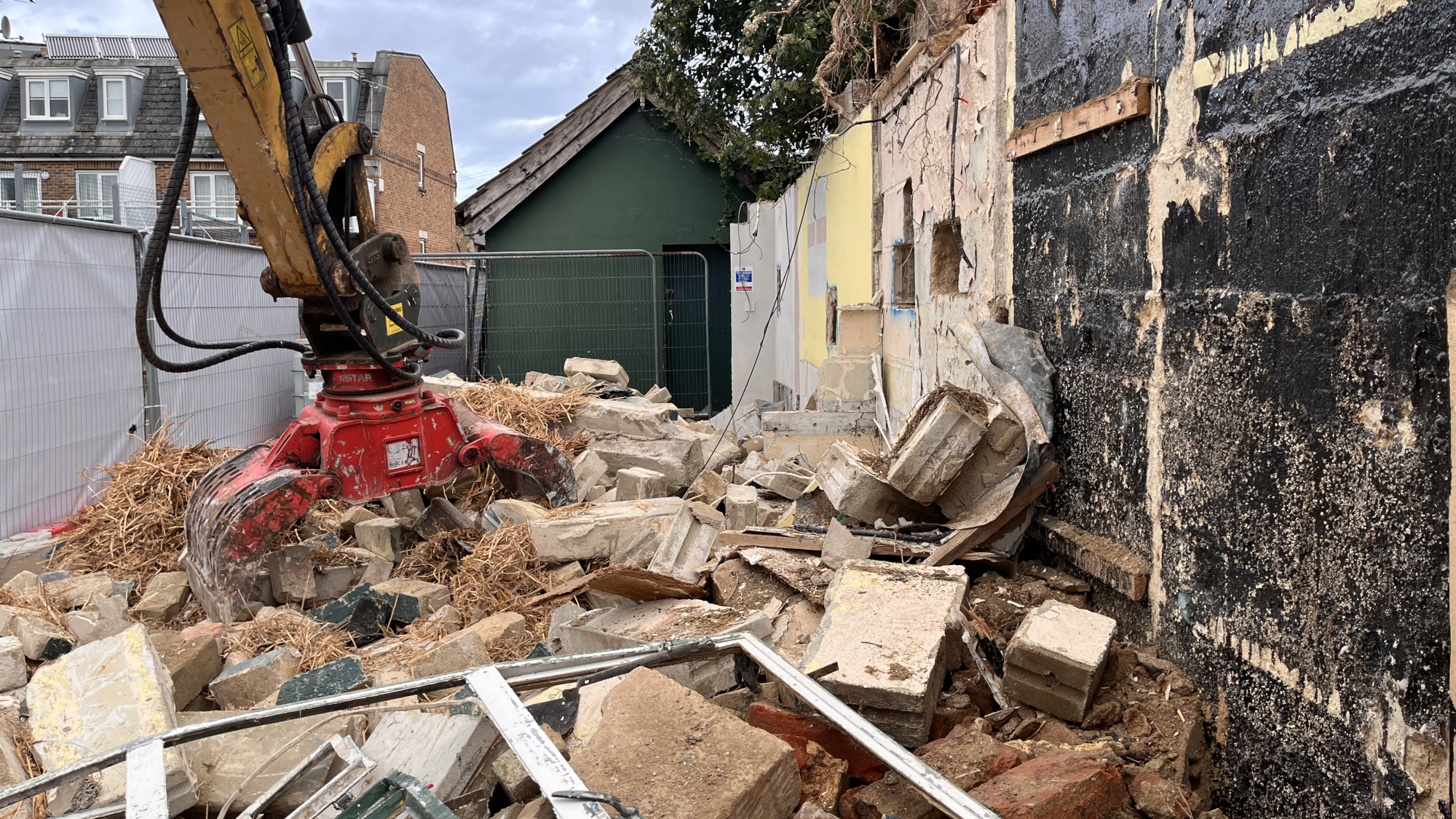 One building down by December 7