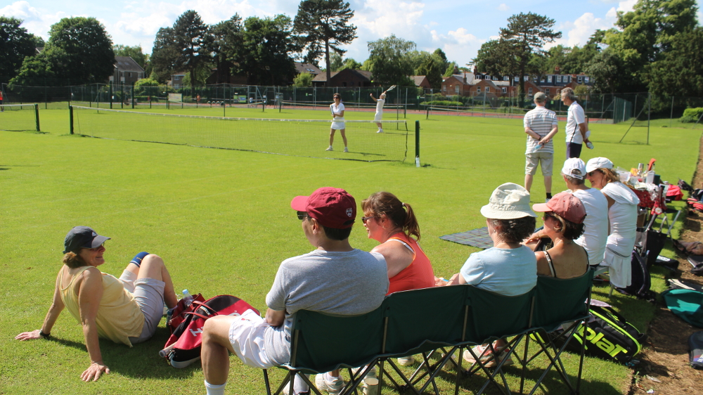 A grandstand view of another fierce service from Michael Barnes. But is anyone watching?
